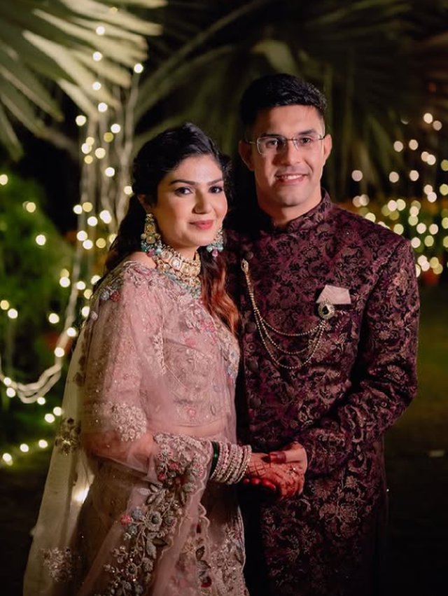 Bride and groom together at an engagement celebration, radiant engagement makeup look